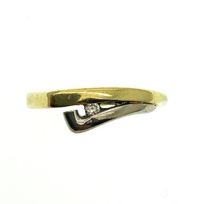 Image 2 of Two-tone gold solitaire ring with 0.03 ct diamond.