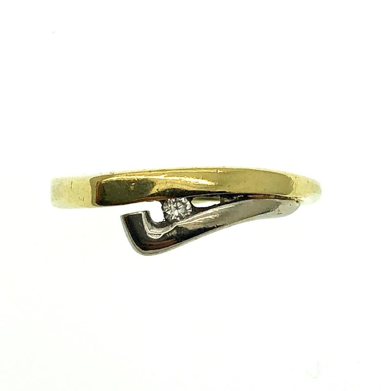 Image 2 of Two-tone gold solitaire ring with 0.03 ct diamond.