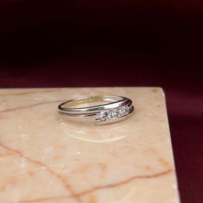 Image 2 of White gold ring with 0.105 ct diamond.