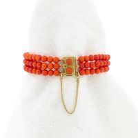 Antique red coral bead bracelet with gold decorative clasp