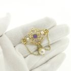 Image 10 of Gold brooch with pearls and purple glass bead