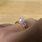 Image 11 of Two-tone gold ring with pearl and diamonds; 0.06 ct.