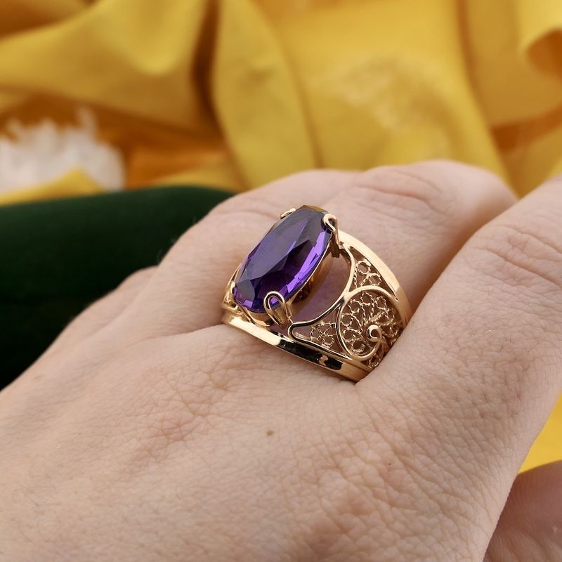 Image 4 of Vintage rose gold ring set with a synthetic purple gemstone.