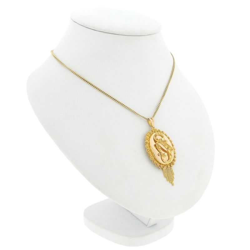 Image 4 of gold pendant of a hat bell