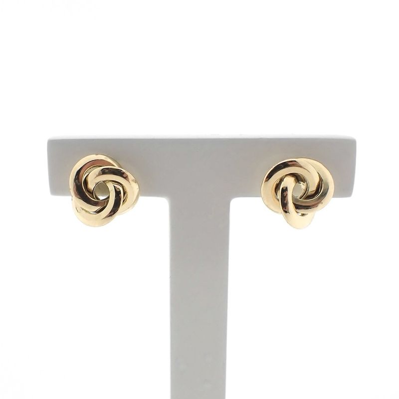 Image 1 of Gold stud earrings as a button