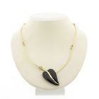 Image 1 of Gold necklace with onyx and diamonds; 0.03 ct.