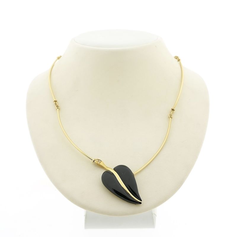 Image 1 of Gold necklace with onyx and diamonds; 0.03 ct.