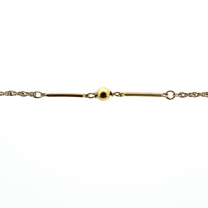 Image 4 of Gold long chain with balls and bars.