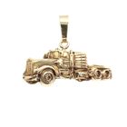 Image 1 of Gold pendant of a truck
