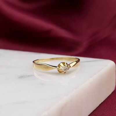 Image 2 of Gold solitaire ring with diamond; 0.03 ct.