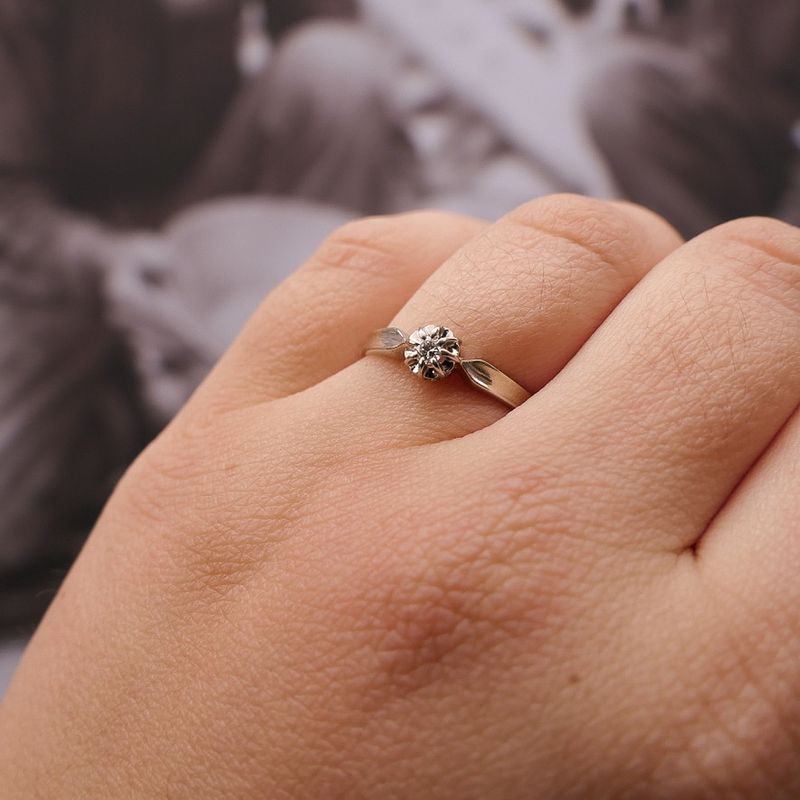 Image 4 of White gold solitaire ring with 0.06 ct diamond.