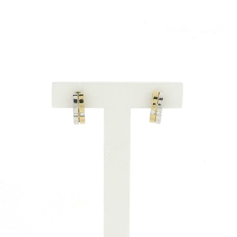 Image 1 of Bicolor gold stud earrings with diamond; 0.08 ct.