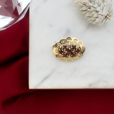 Vintage gold brooch with garnet Image 2 of Vintage gold brooch with garnet