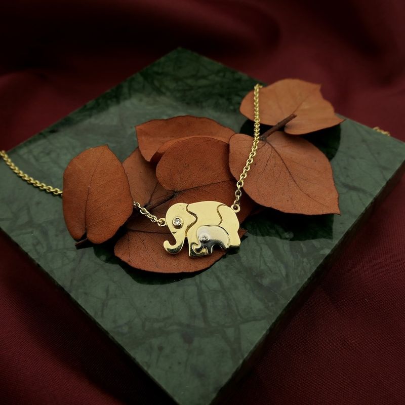 Image 2 of Two-tone gold necklace with fixed pendant and diamonds; 0.03 ct.