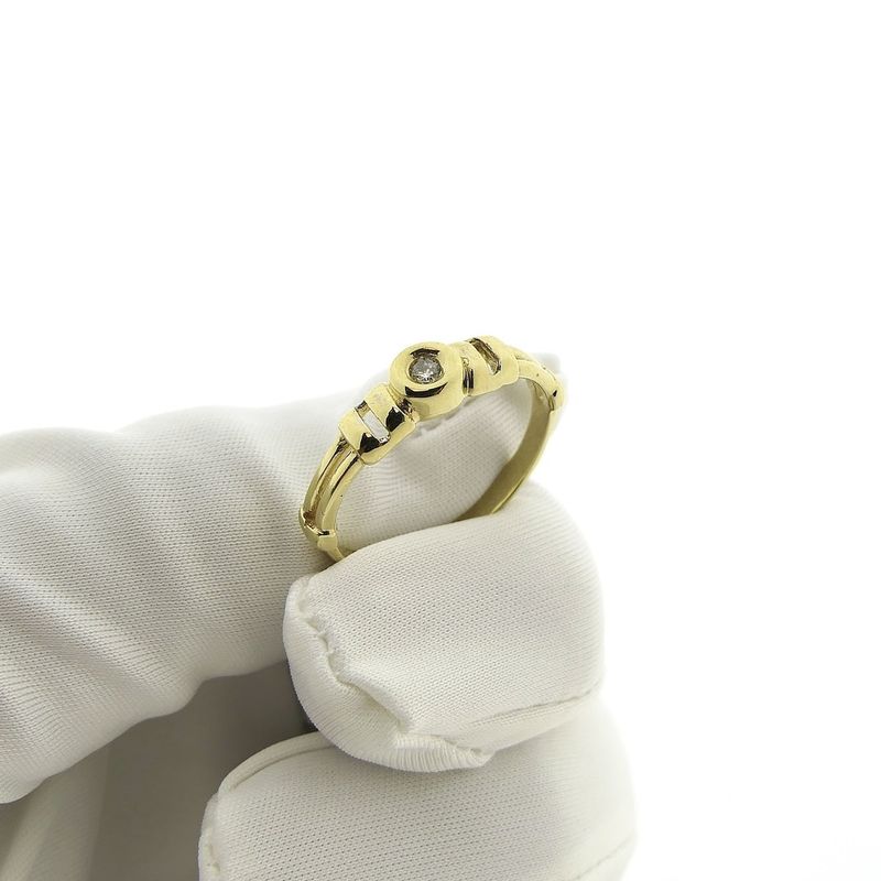 Image 10 of Gold solitaire ring with diamond; 0.025 ct.