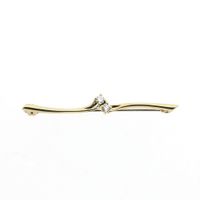 Gold brooch with diamonds; 0.08 ct.