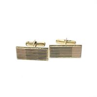 Gold cufflinks