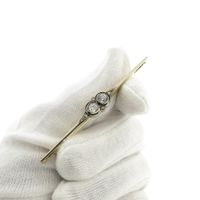 Gold Art Deco bicolor brooch with diamond; 0.84 ct.