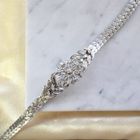 Image 2 of White gold herringbone link bracelet with 0.525 ct diamonds.