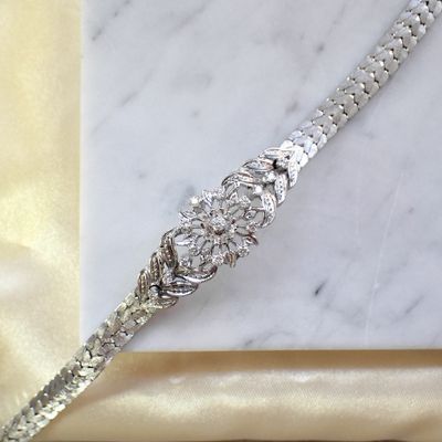 Image 2 of White gold herringbone link bracelet with 0.525 ct diamonds.