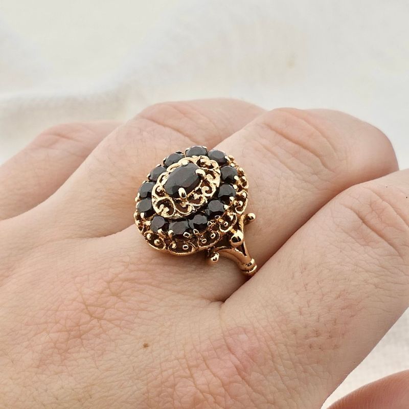 Image 4 of Gold entourage ring with garnet