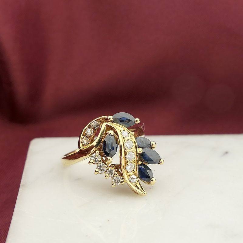 Image 7 of Gold ring with sapphire and diamond; 0.18 ct.