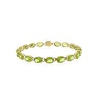Image 1 of Gold tennis bracelet with peridot | 18 cm