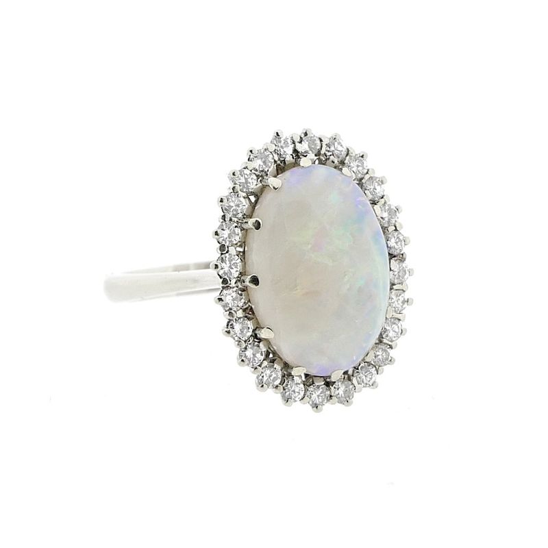 Image 7 of 18-karat white gold ring with opal and entourage of diamonds | 0.60 ct.