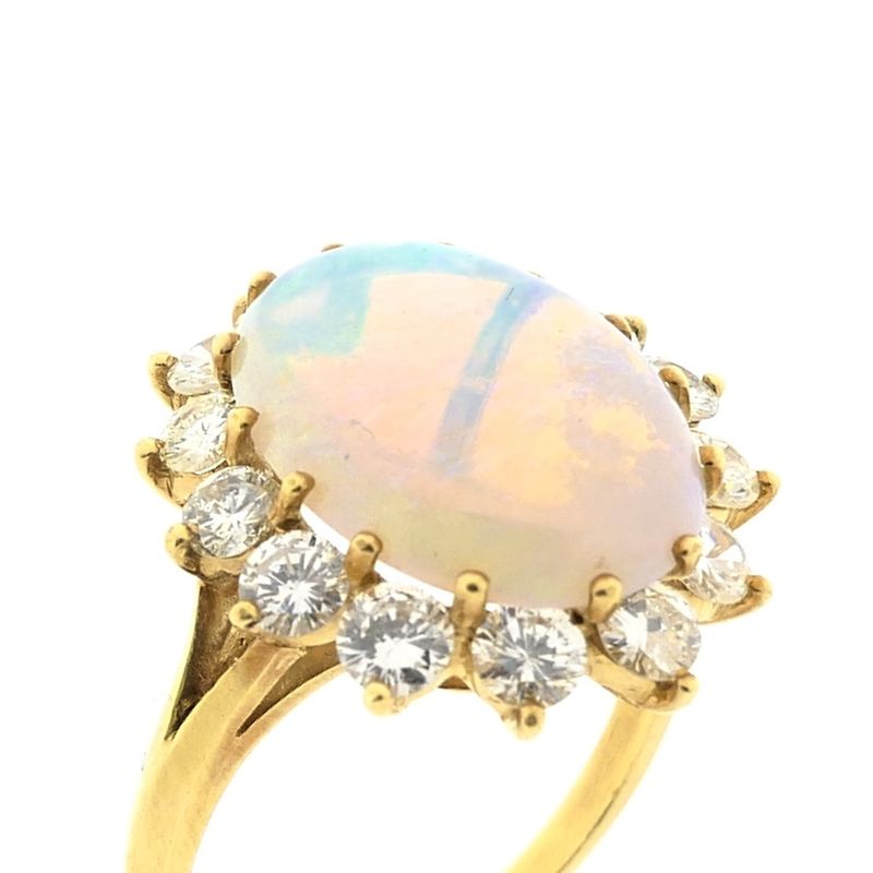 Image 3 of Gold ring with opal and diamond; 1.26 ct.