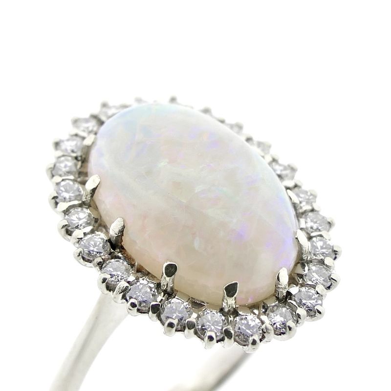 Image 3 of 18-karat white gold ring with opal and entourage of diamonds | 0.60 ct.