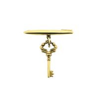 Gold brooch with vintage skeleton key