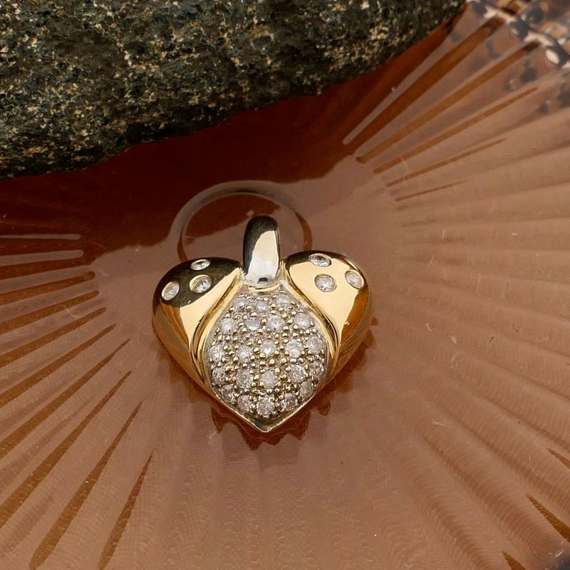 Image 2 of Bicolor gold heart pendant set with diamonds; Approx. 0.70 ct.