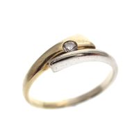 Two-tone gold solitaire ring with diamond