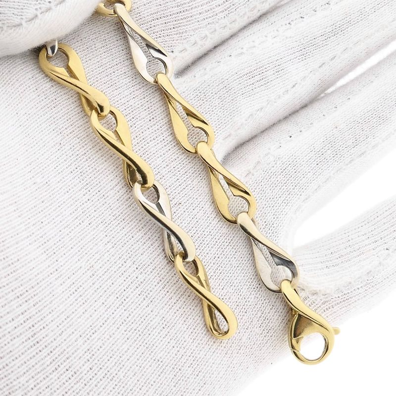 Afbeelding 8 van Bicolor gouden infinity schakelarmband