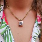 Image 11 of Two-tone gold necklace with topaz and diamond; 0.06 ct.