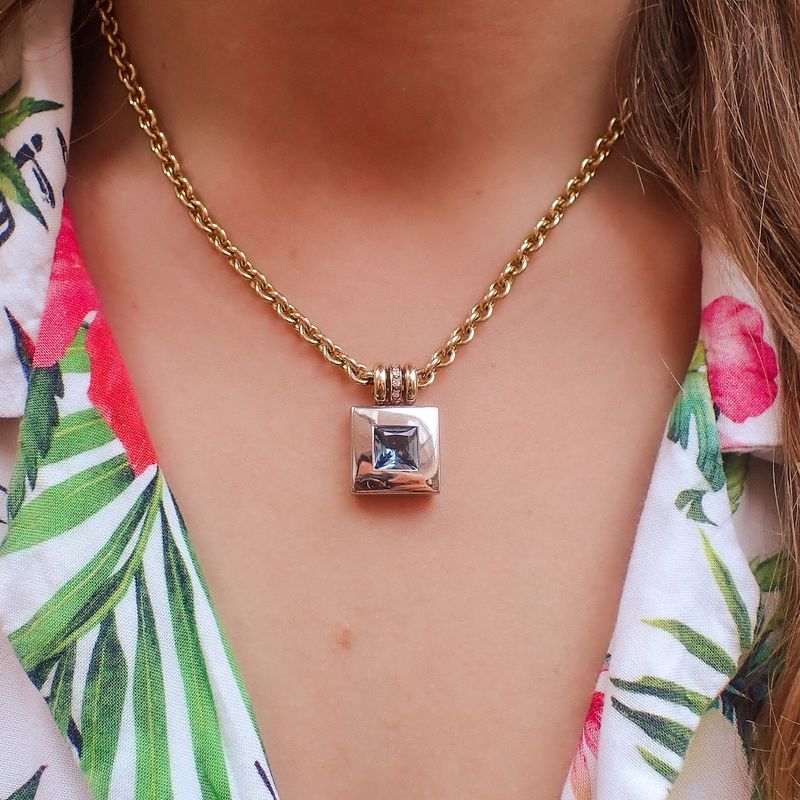 Image 11 of Two-tone gold necklace with topaz and diamond; 0.06 ct.