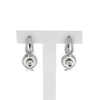 White gold earrings with diamonds; 0.59 ct.