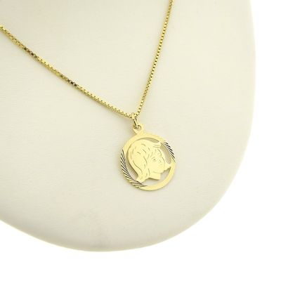 Image 2 of Gold pendant of a girl's child's head