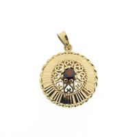 Vintage gold pendant with garnet