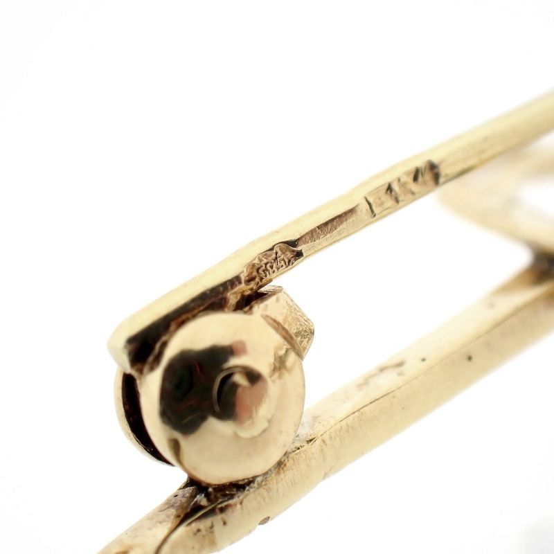 Image 7 of Golden polo sports brooch.