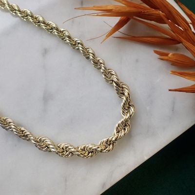 Golden twisted link chain. Image 2 of Golden twisted link chain.