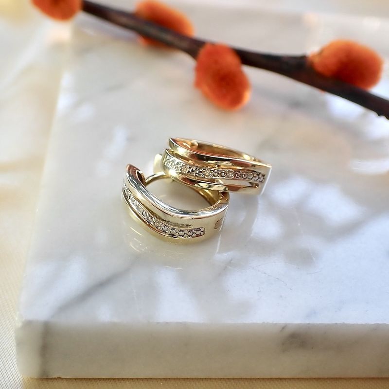 Image 9 of Two-tone gold hoop earrings with diamonds | 0.03 ct.