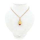 Image 3 of Two-tone gold pendant with stars and carnelian