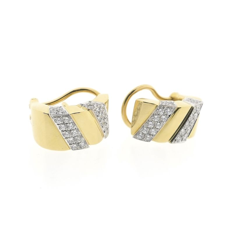 Image 9 of Gold stud earrings set with diamonds; 0.70 ct.