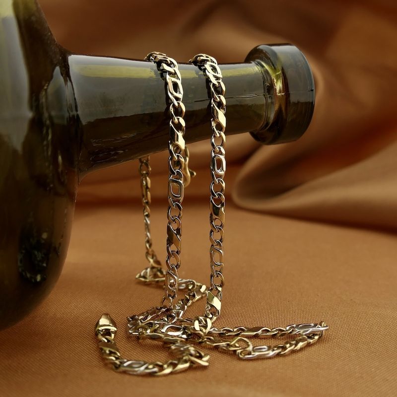 Image 2 of Two-tone gold Figaro link chain