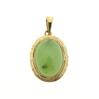 Gold pendant with Jade