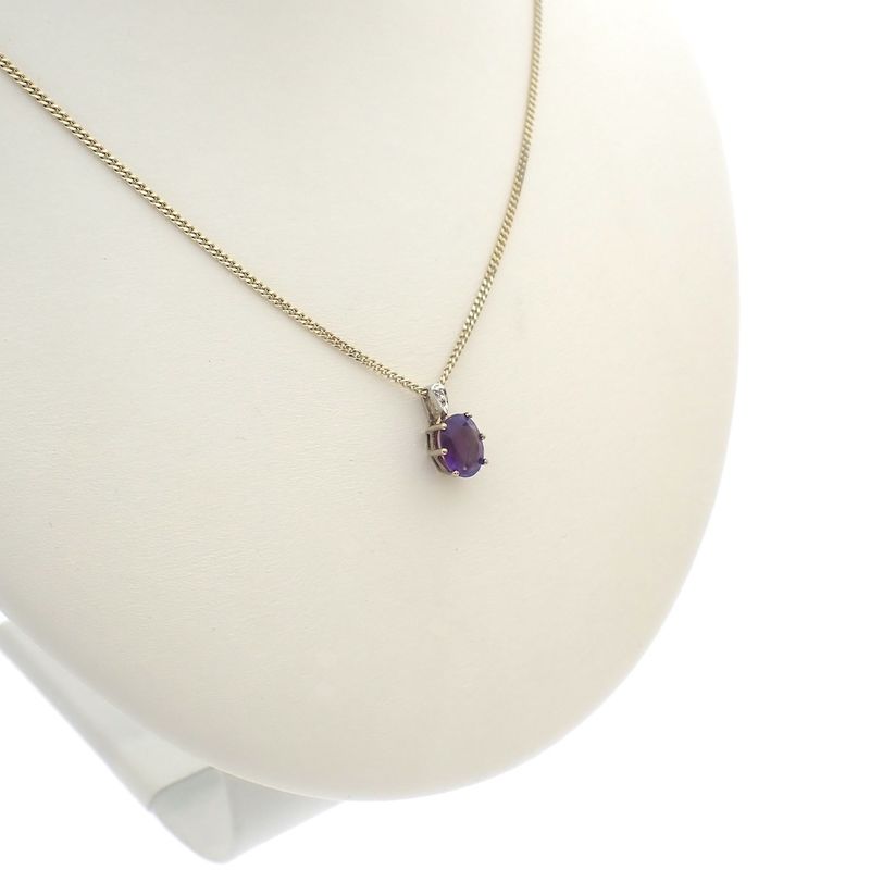 Image 9 of Two-tone gold pendant with amethyst and diamond | 0.005 ct.