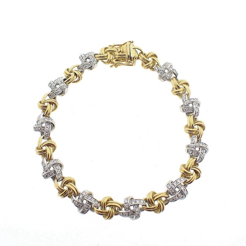 Image 1 of Two-tone gold link bracelet with diamonds; 1.00 ct.