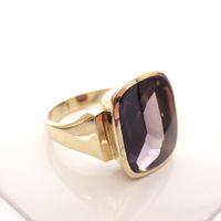 Gold men's ring with synthetic sapphire