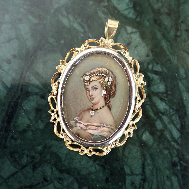 Image 2 of Vintage two-tone gold pendant/brooch with a painted portrait and diamonds; 0.015 ct.